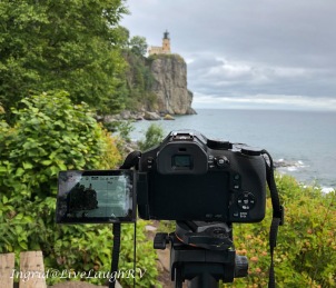 A camera shown photographing Split Rock Lighthouse